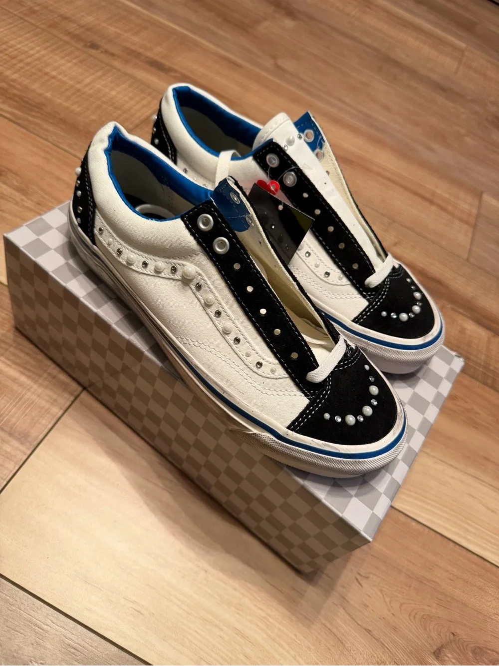 Vans White & Black Studded Low-Top Skate Sneaker with Blue Trim